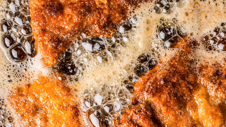 frying chicken in oil