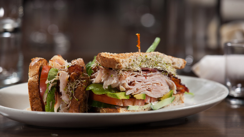 Avocado club sandwich on a plate