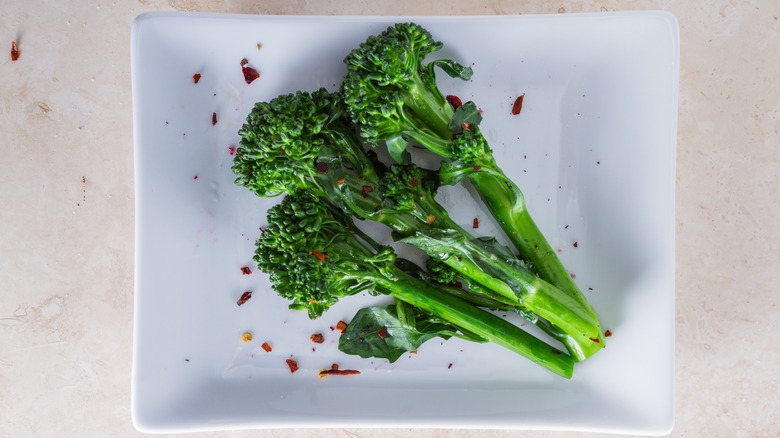 broccoli with red pepper flakes on a plate