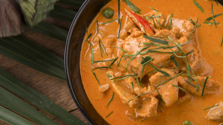 Panang curry topped with sliced Makrut leaves