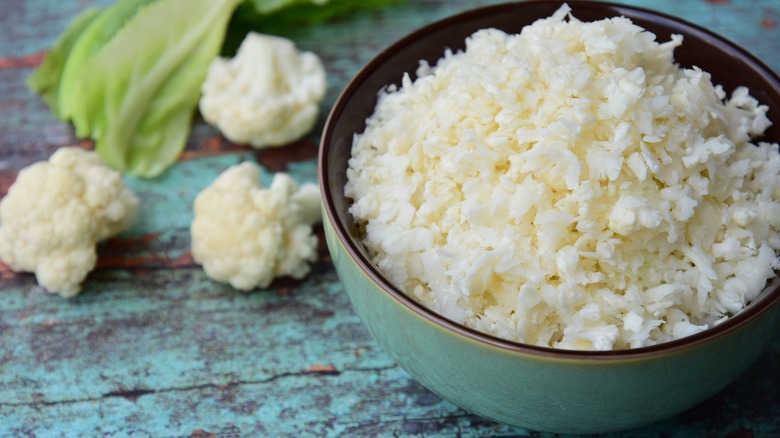 Cauliflower rice in green bowl