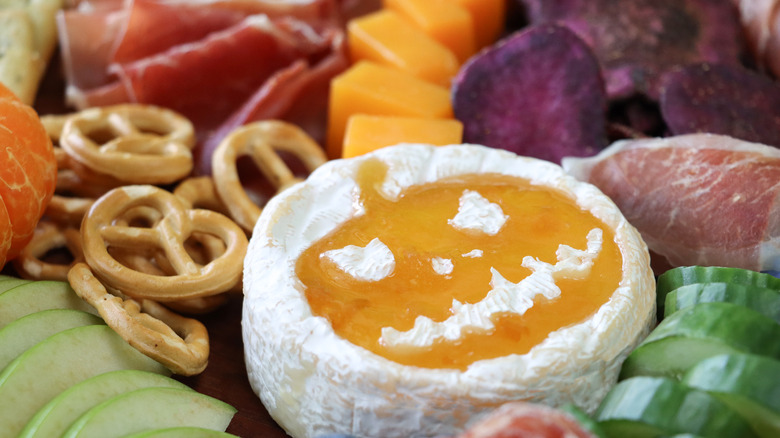 jack-o'-lantern shape carved into cheese