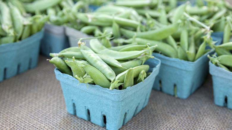 Punnets of sugar snap peas