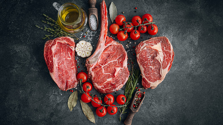 cuts of steak with tomatoes