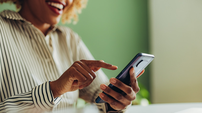 woman using smartphone