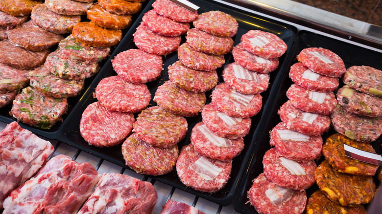 Hamburgers in a display case