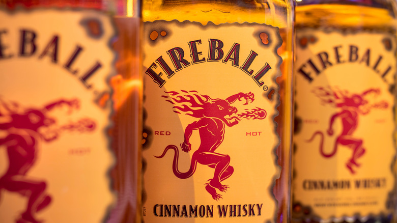 Close up of bottles of Fireball cinnamon whisky.