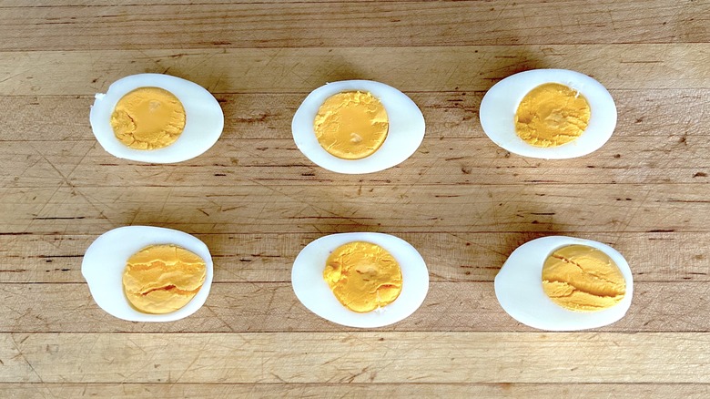 Halved hard-boiled eggs