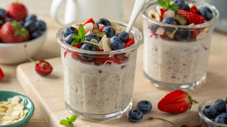 containers of overnight oats with fruit