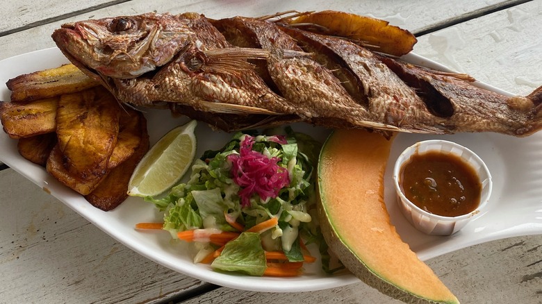 fried fish with side dishes