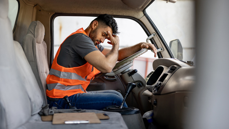 man falling asleep at wheel