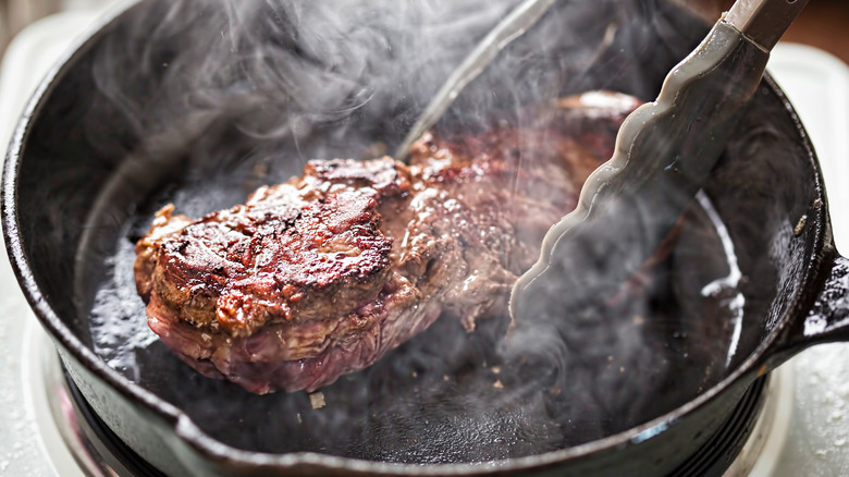 searing steak in cast iron skillet