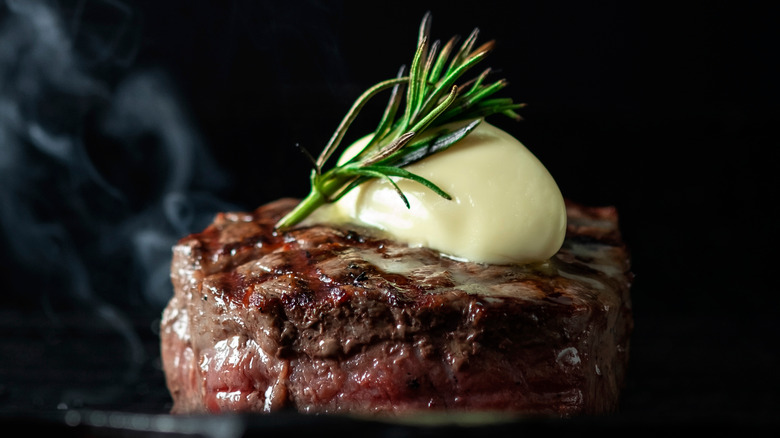 steak with large butter topping