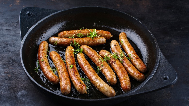 hot dogs in cast iron pan