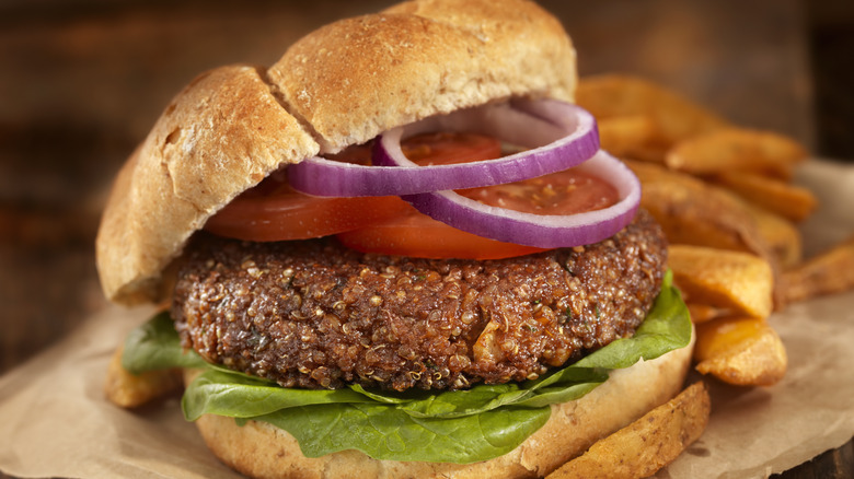 Close-up of a plant-based burger and fries