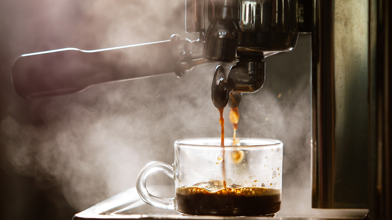 Espresso brewing in small cup