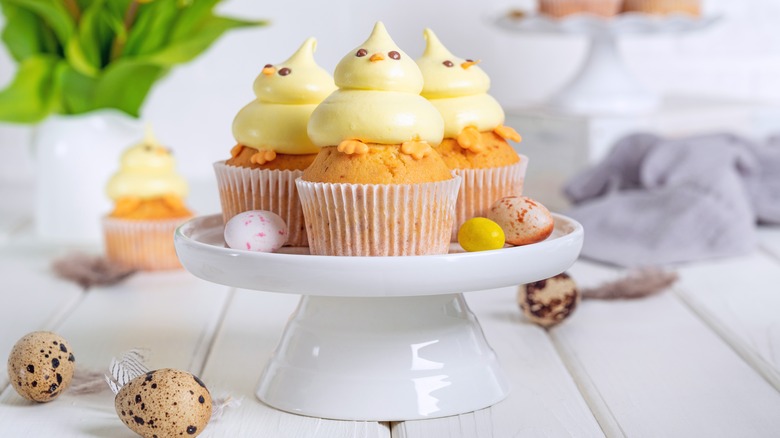 Three cupcakes decorated as chicks