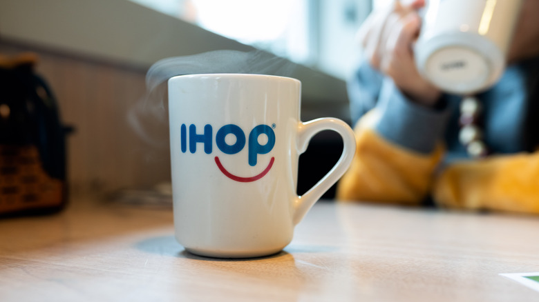 An IHOP mug on a table