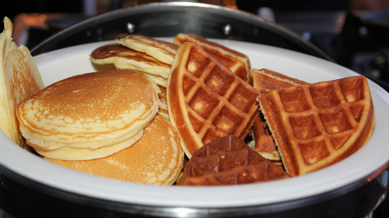 Pancakes and waffles in a serving dish