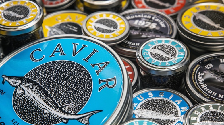 several tins of different caviar