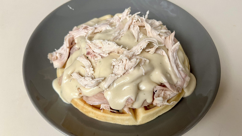 waffle with chicken and gravy on top