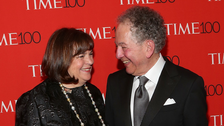 Ina and Jeffrey Garten smile at event