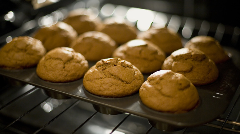 Freshly baked muffins sitting in oven