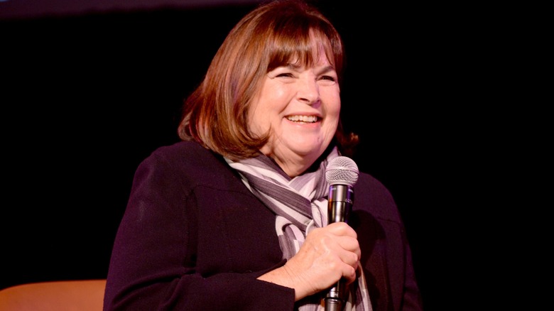 Ina Garten smiling with microphone