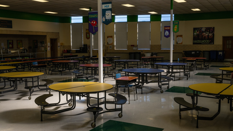 dark school cafeteria sitting empty