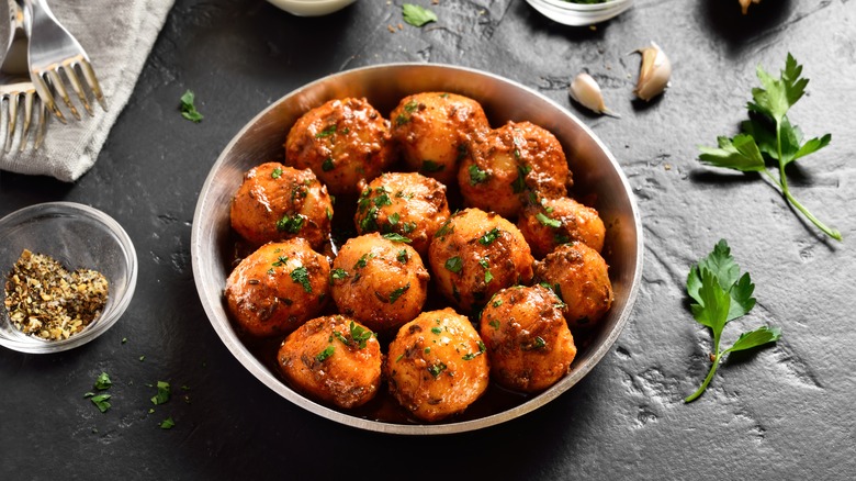 Masala roasted potatoes in bowl