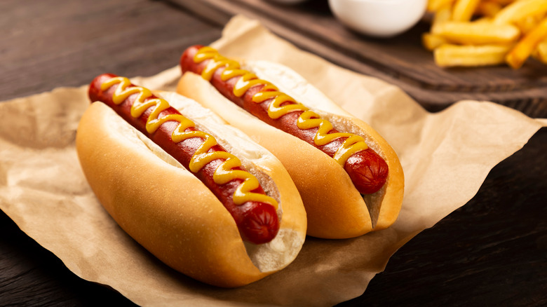 Hot dogs with mustard and fries