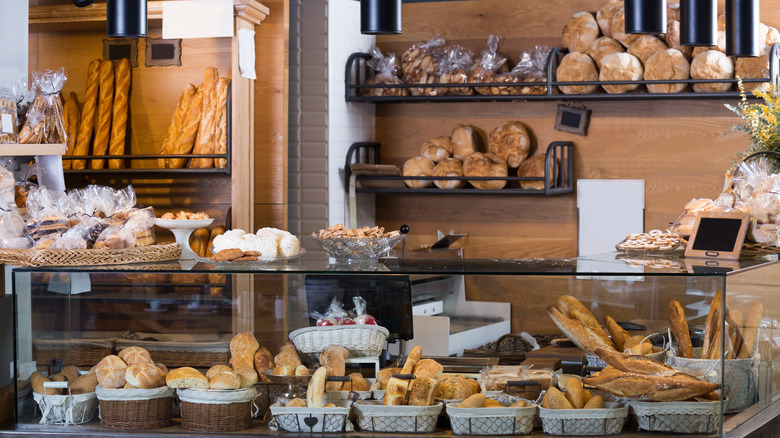 the interior of a French bakery offering bread and pastries