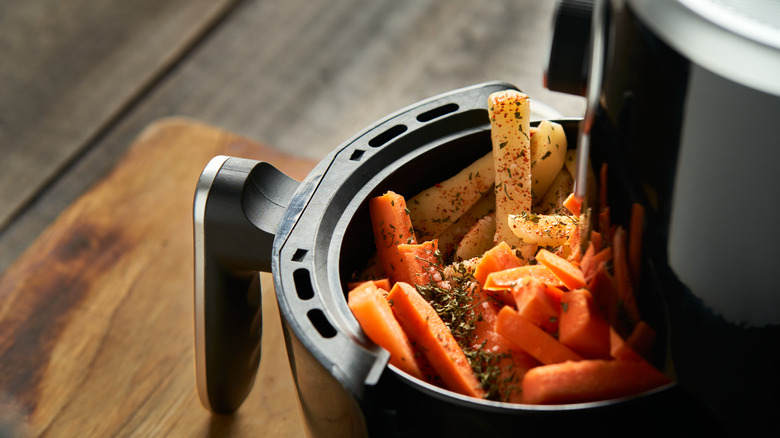 Carrots and potatoes cooked in an air fryer