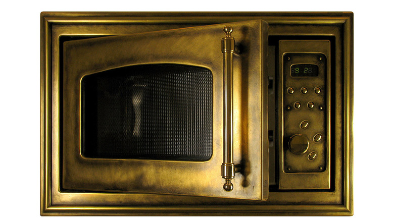 Open vintage gold microwave