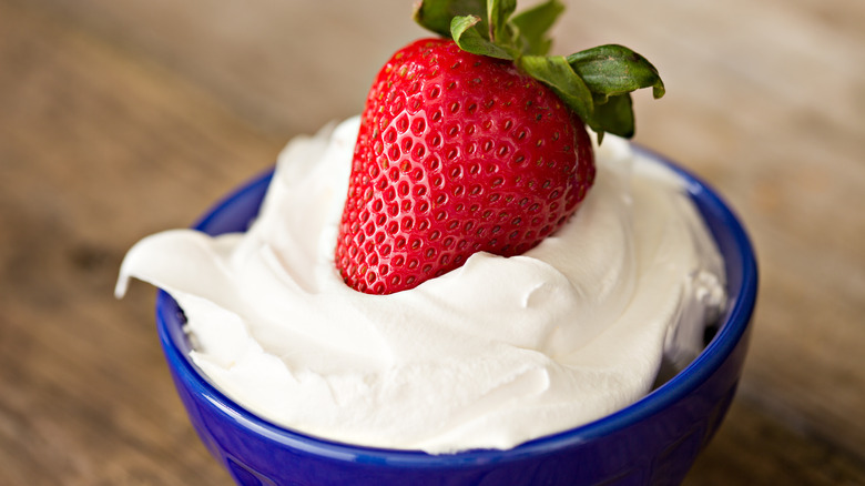 whipped cream and strawberry