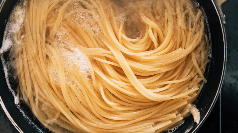 Spaghetti in pot of water