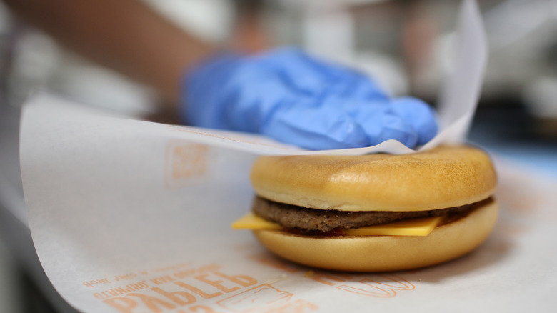 McDonald's burger being wrapped