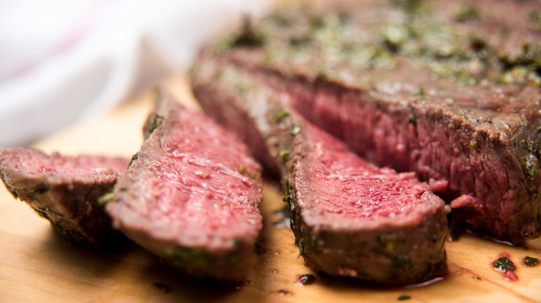 uncooked London broil laying flat