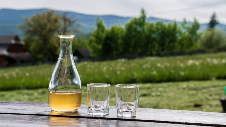 Mead in a glass decanter with serving glasses