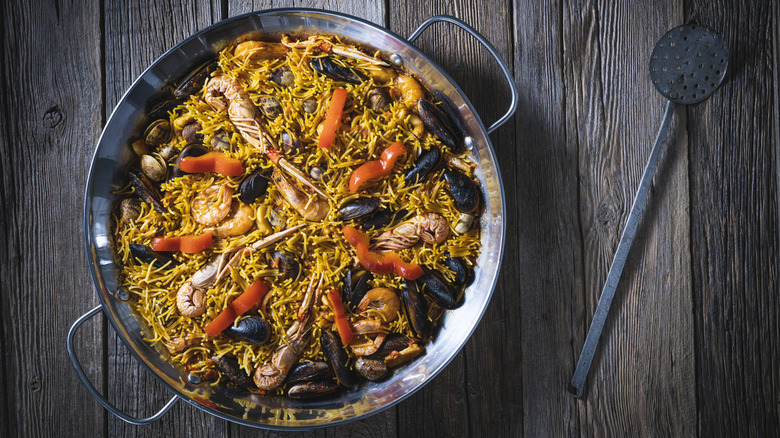 Pan of paella on wood