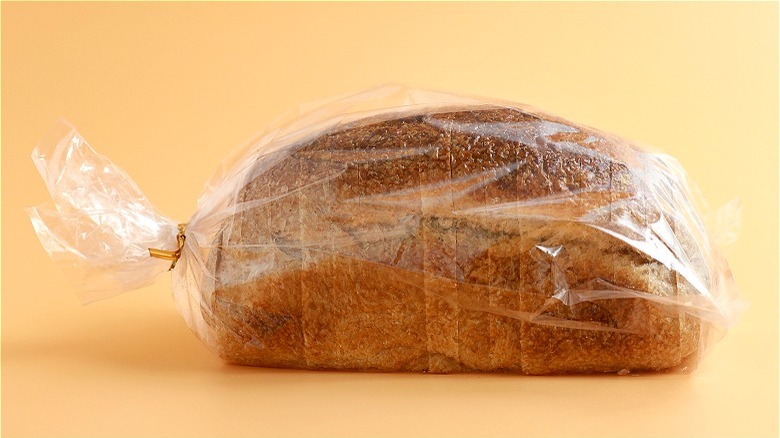 Packaged bread on orange background 