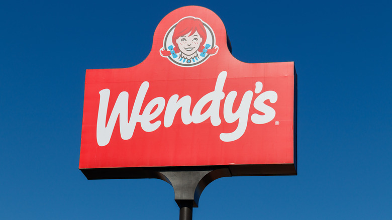 Wendy's sign against blue sky