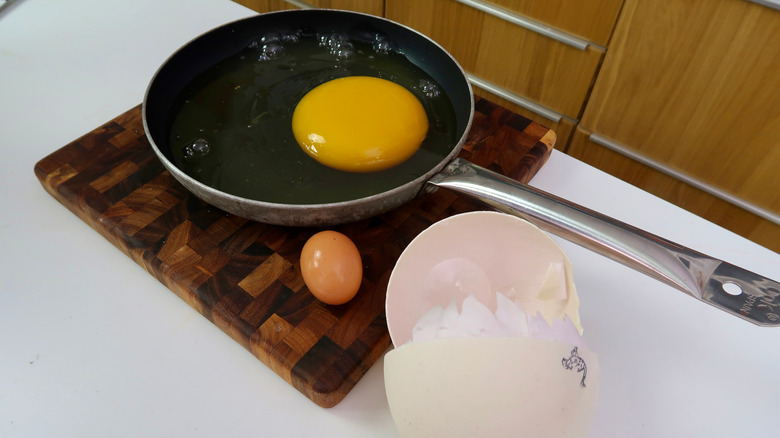 ostrich egg in pan