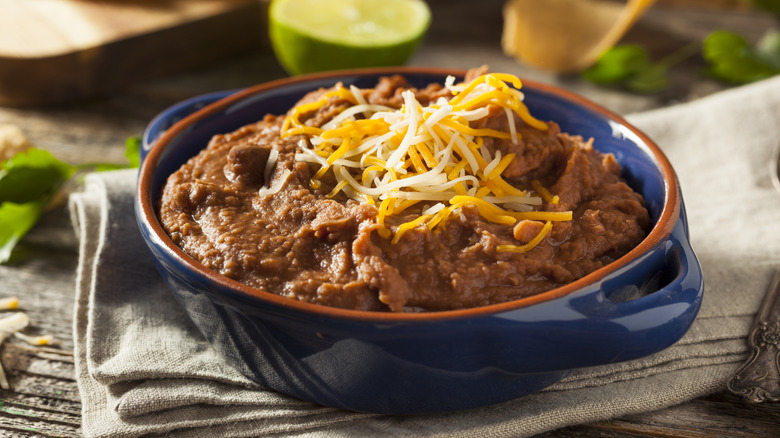 Bowl of refried beans with cheese