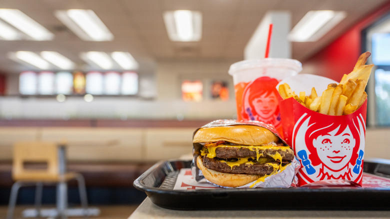 Tray of Wendy's food inside restaurant