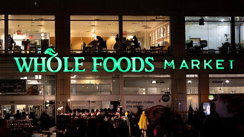 Whole Foods storefront at night 