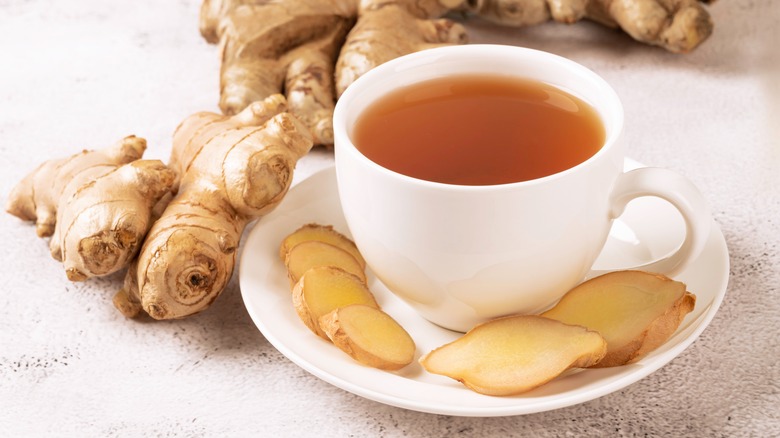 Tea cup with ginger roots