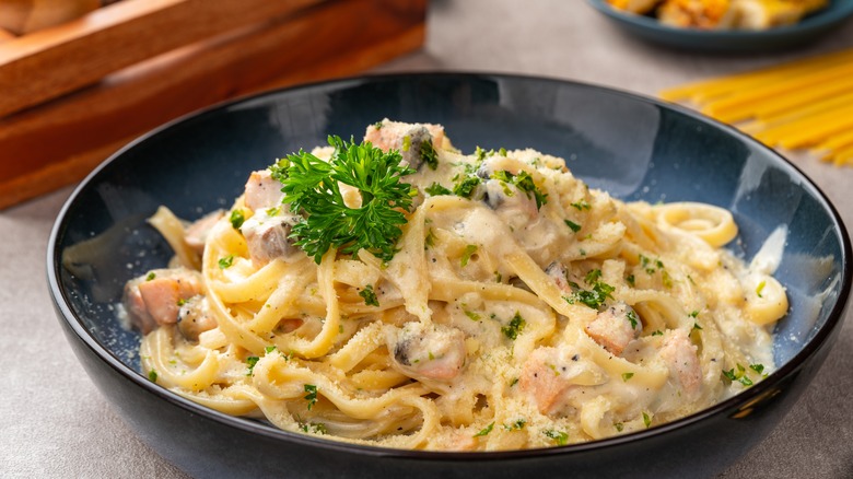 A bowl of fettucine carbonara.