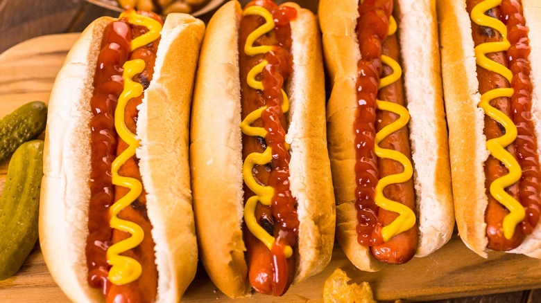 hot dogs on cutting board