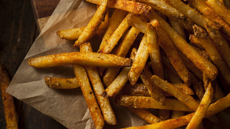 French fries on parchment paper